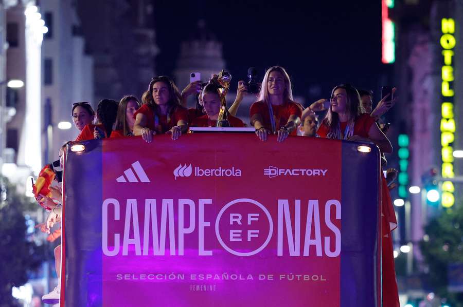 The winning squad celebrates the World Cup triumph in the streets of Spain