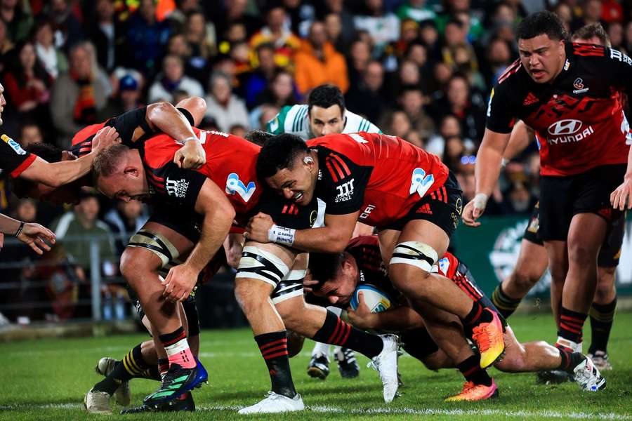 Crusaders' Codie Taylor scores during the Super Rugby Pacific final between Chiefs and Crusaders in Hamilton