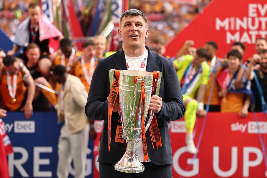 Sergej Jakirovic holding Hull City's play-off trophy