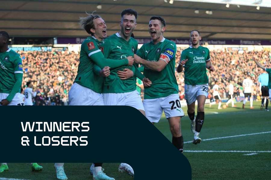 Die Spieler von Plymouth Argyle feiern den sensationellen Sieg über den FC Liverpool.