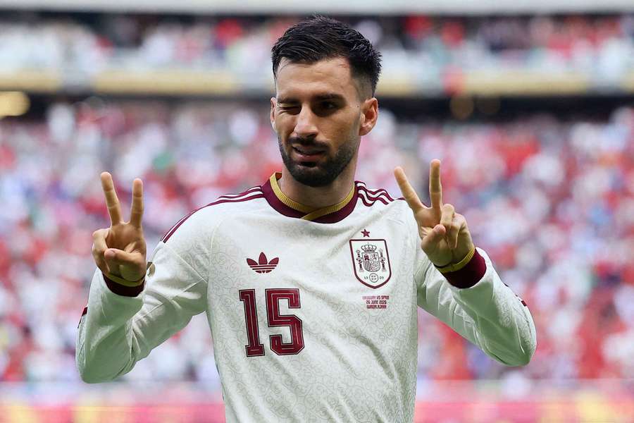 Alex Baena celebrates after scoring the decisive goal for Spain