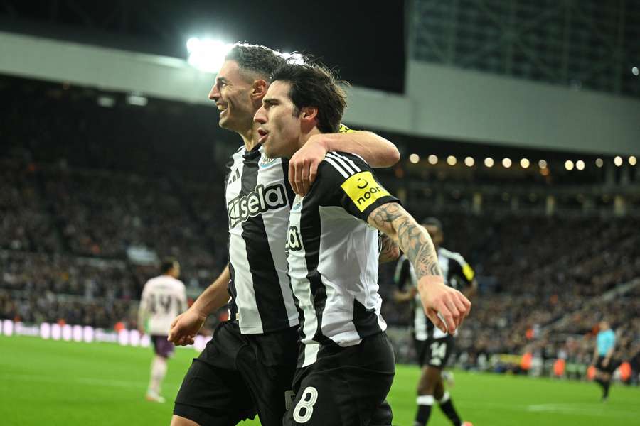 Sandro Tonali of Newcastle United celebrates scoring his team's second goal with teammate Fabian Schaer 