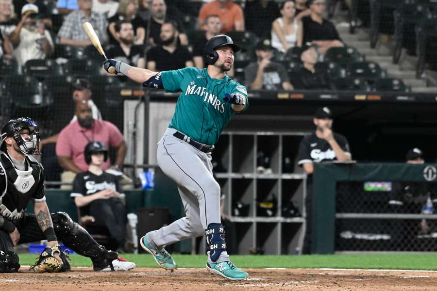 Raleigh hits a three-run home run against the Chicago White Sox during the eighth inning