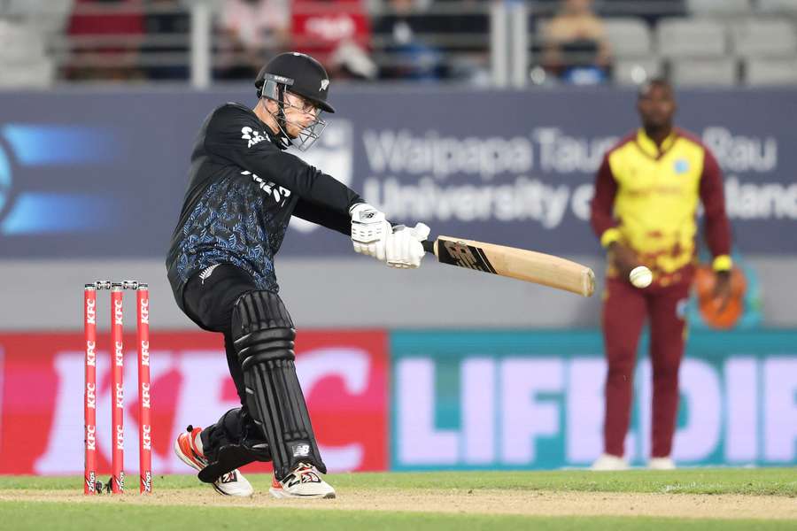 New Zealand captain Mitchell Santner strikes one of his ten boundaries on Wednesday night. New Zealand captain Mitchell Santner strikes one of his ten boundaries on Wednesday night.