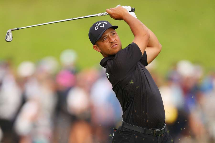 Xander Schauffele clung to a one-stroke lead as he began the back nine in the third round of the PGA Championship