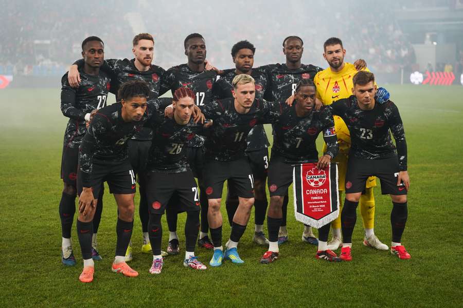 Canada's men's national team posing for a picture before their friendly against Tunisia