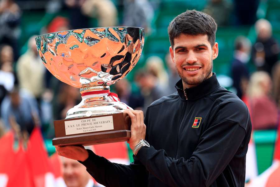 Alcaraz celebrates with the trophy after winning his first title at the Monte-Carlo Masters