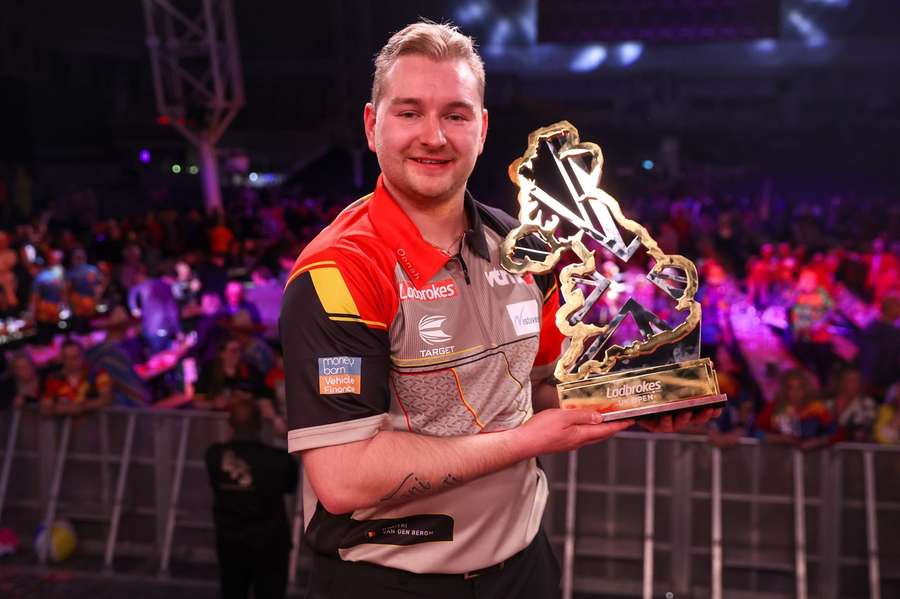 Dimitri Van den Bergh with the trophy after his fine victory