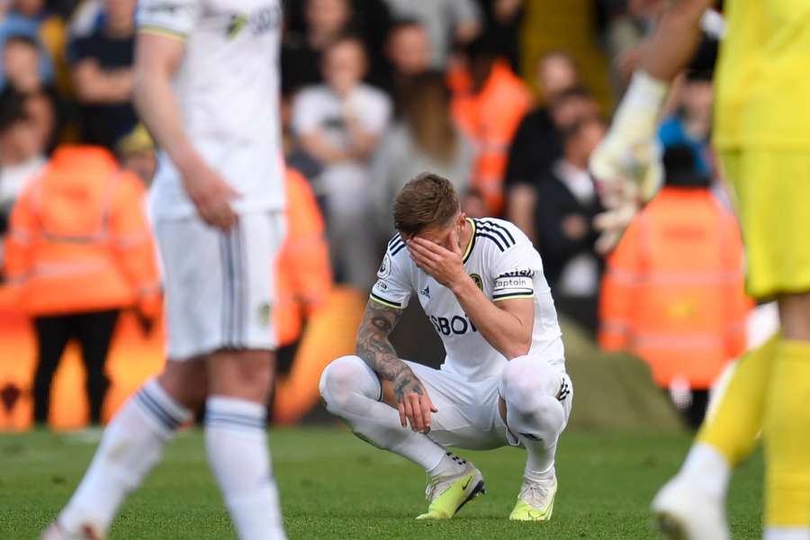 Leeds United's English-born Scottish defender Liam Cooper reacts to their defeat on the pitch