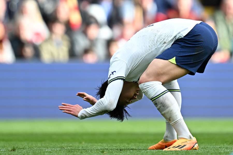 Heung-min Son reacts after hitting the post