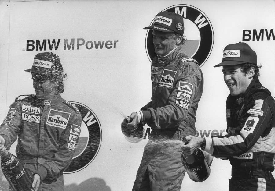 Niki Lauda, Alain Prost en Ayrton Senna op het podium in 1985