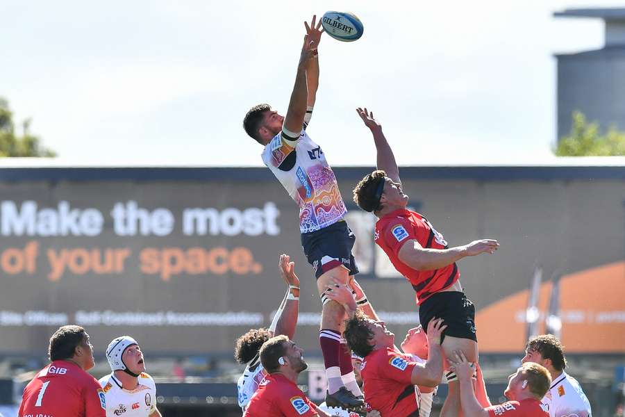 Liam Wright wins a lineout for the Reds against the Crusaders. Liam Wright wins a lineout for the Reds against the Crusaders.