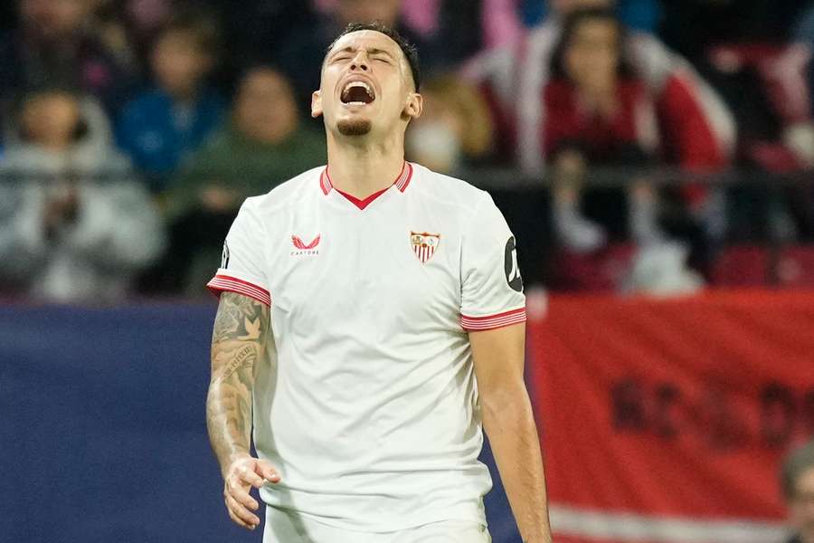 Sevilla's Lucas Ocampos shouts after receiving a red card