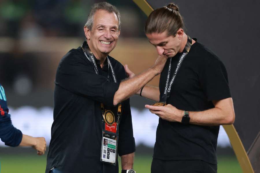 Bap ao lado do técnico Filipe Luís depois da conquista do tetracampeonato da Libertadores