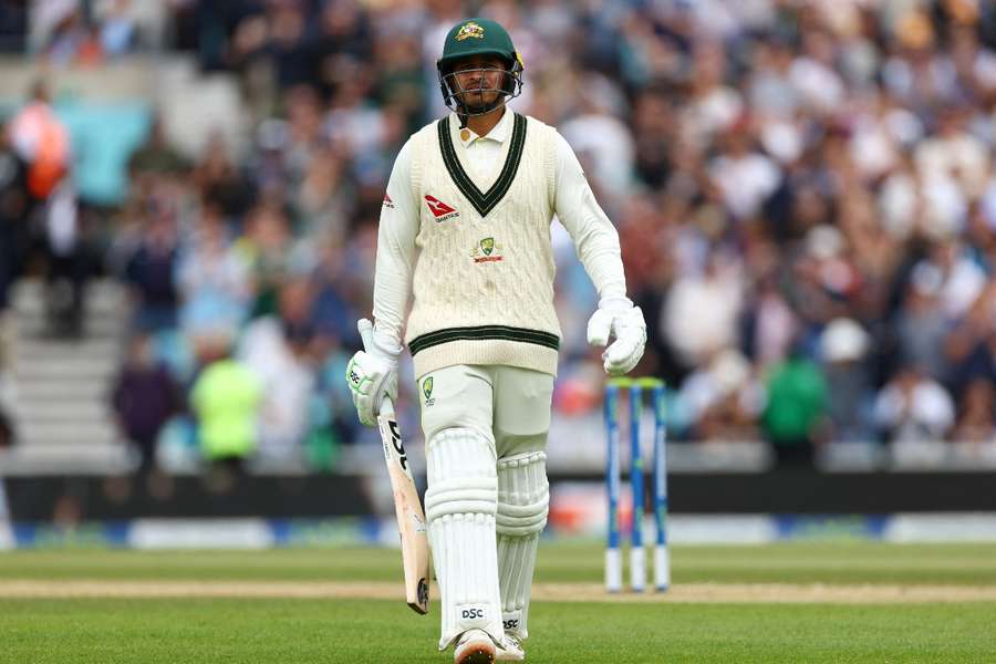 Australia's Usman Khawaja walks after losing his wicket