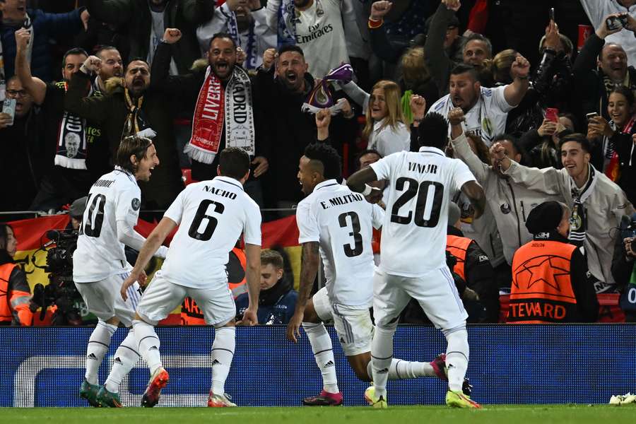 Real Madrid's Brazilian defender Eder Militao celebrates scoring the team's third goal