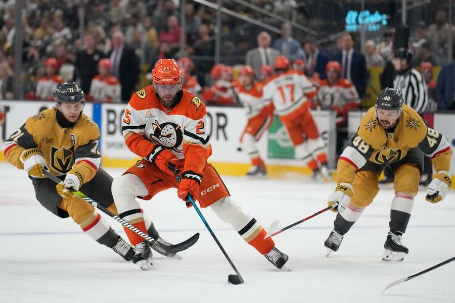 Anaheim Ducks' Ryan Poehling handles the puck in Game 2 against Golden Knights defenders