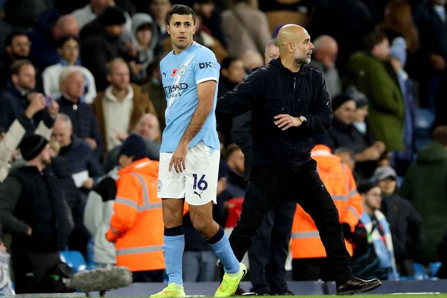 Pep Guardiola și Rodri Pep Guardiola și Rodri