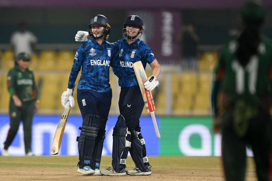 Heather Knight and Charlie Dean celebrate England's win