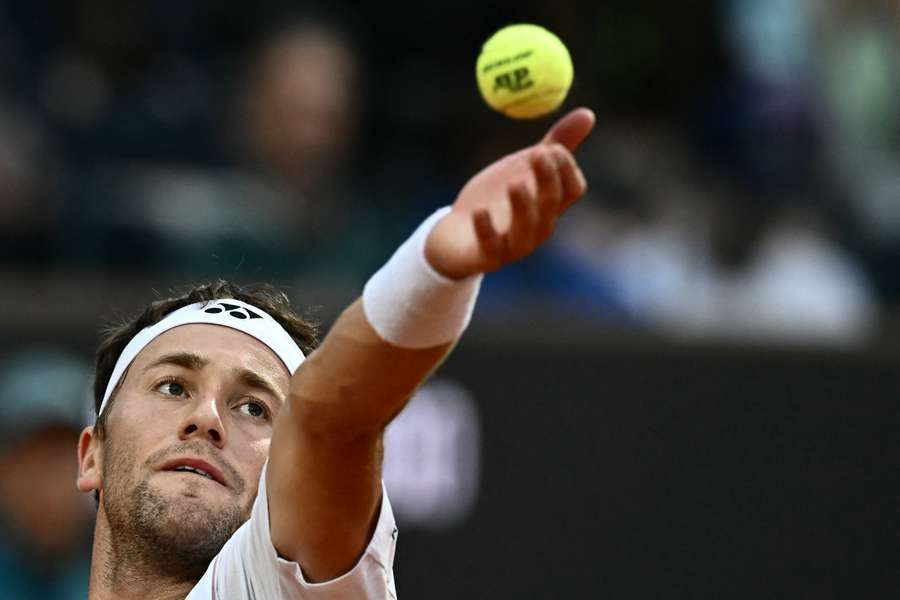 Norway's Casper Ruud serves to Italy's Jannik Sinner during their men's singles quarter-final match at the Rome Open