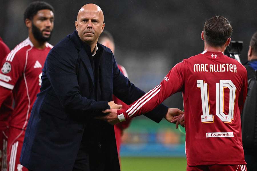 Arne Slot congratulates his players after beating Frankfurt in the Champions League - their only win in their last seven games Arne Slot congratulates his players after beating Frankfurt in the Champions League - their only win in their last seven games