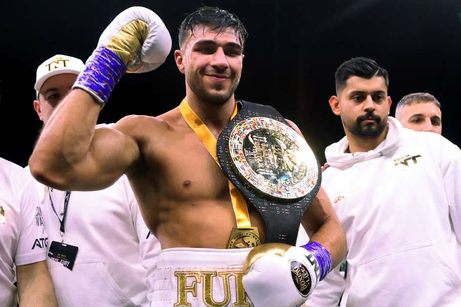 Tommy Fury celebrates his win