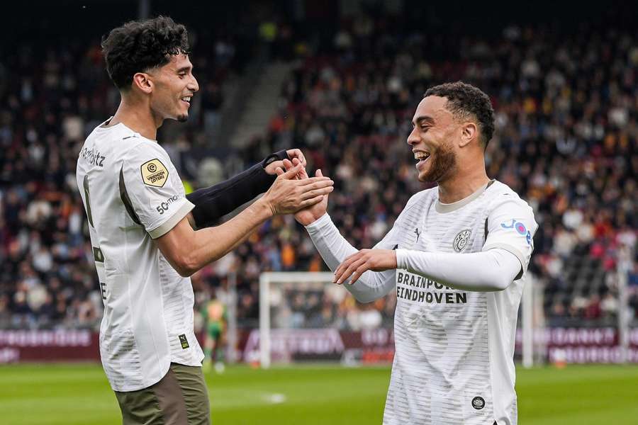 PSV's Ricardo Pepi and Sergiño Dest celebrate the former's 2-1 against Go Ahead Eagles