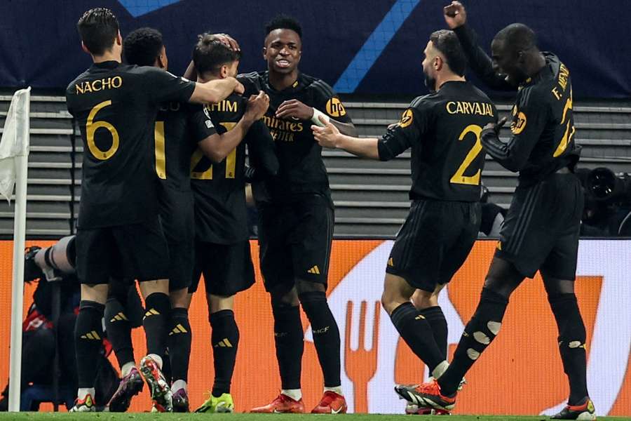 Real Madrid's players celebrate during the UEFA Champions League match with RB Leipzig