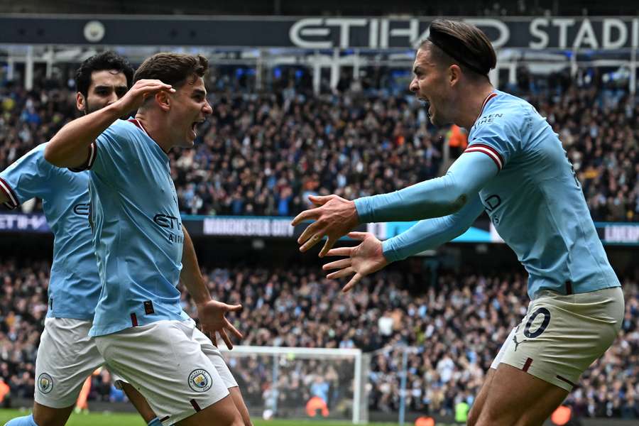 Julian Alvarez (2L) and Jack Grealish (R) were instrumental in Manchester City's 4-1 thrashing of Liverpool
