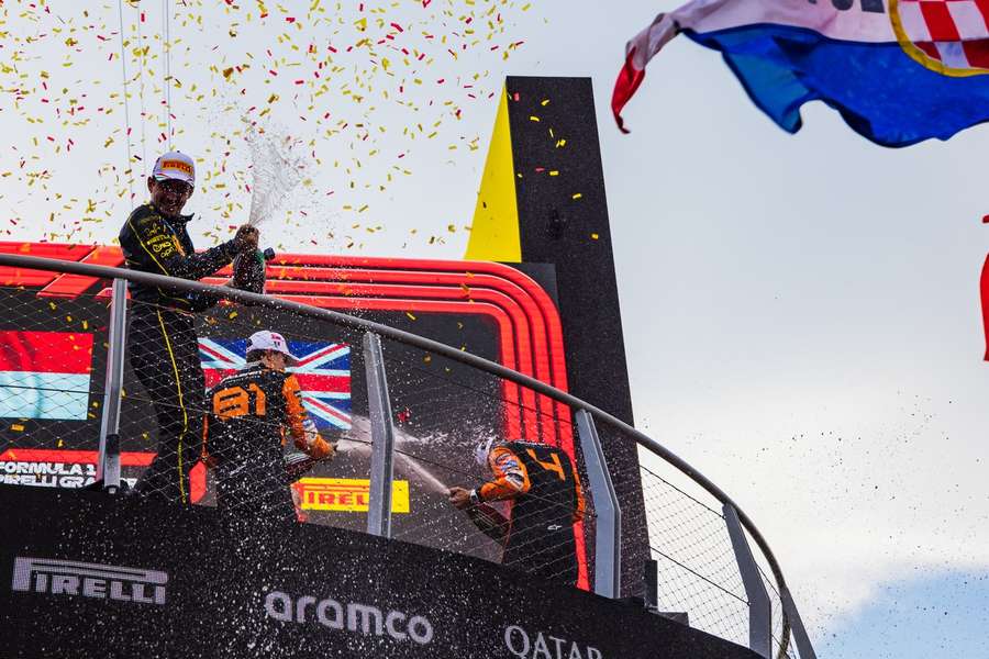 Charles Leclerc celebrates his win in Monza