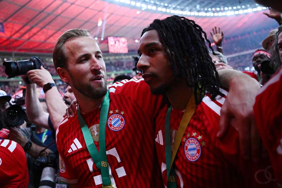 Michael Olise and Harry Kane celebrating the Bundesliga title. Michael Olise and Harry Kane celebrating the Bundesliga title.