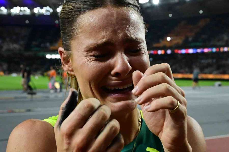 Nina Kennedy reacts after winning gold in the pole vault