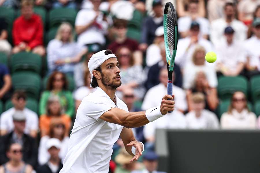 Musetti in action at Wimbledon