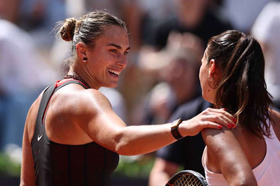 Aryna Sabalenka and Daria Kasatkina embrace after the match