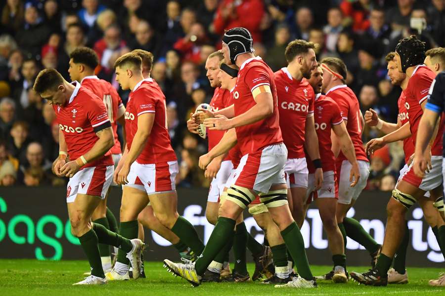 Wales players celebrate their first try during the Six Nations international rugby union match between Scotland and Wales