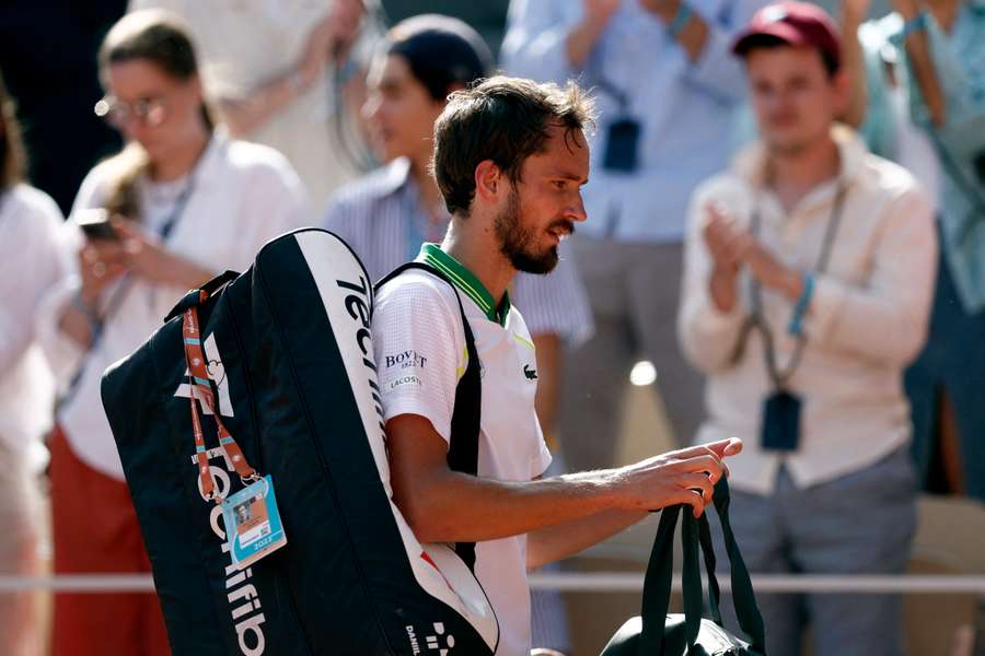 Daniil Medvedev walks off the court having suffered a first-round exit