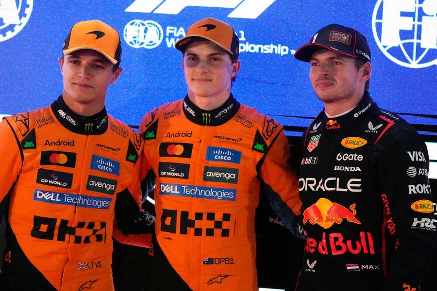 Red Bull's Max Verstappen (R) and McLaren's Lando Norris (L) and Oscar Piastri (C) are in a three-way bid for the championship