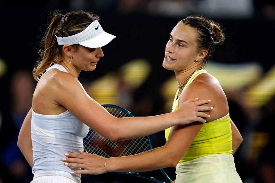 Paula Badosa, left, and Aryna Sabalenka embrace after the game