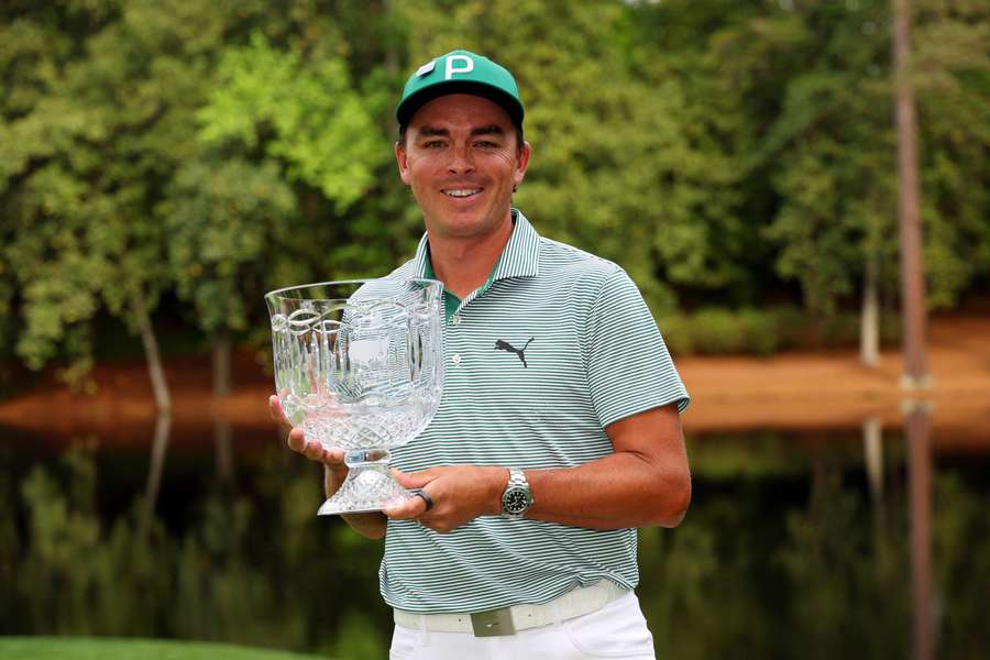 Rickie Fowler of the United States celebrates after winning the par-3 contest