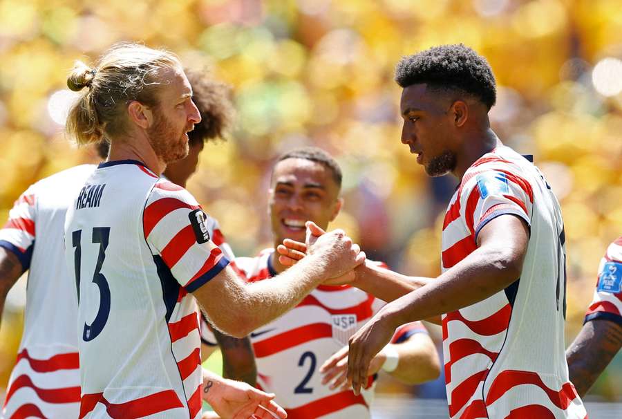 Freeman (R) scored the USA's second goal