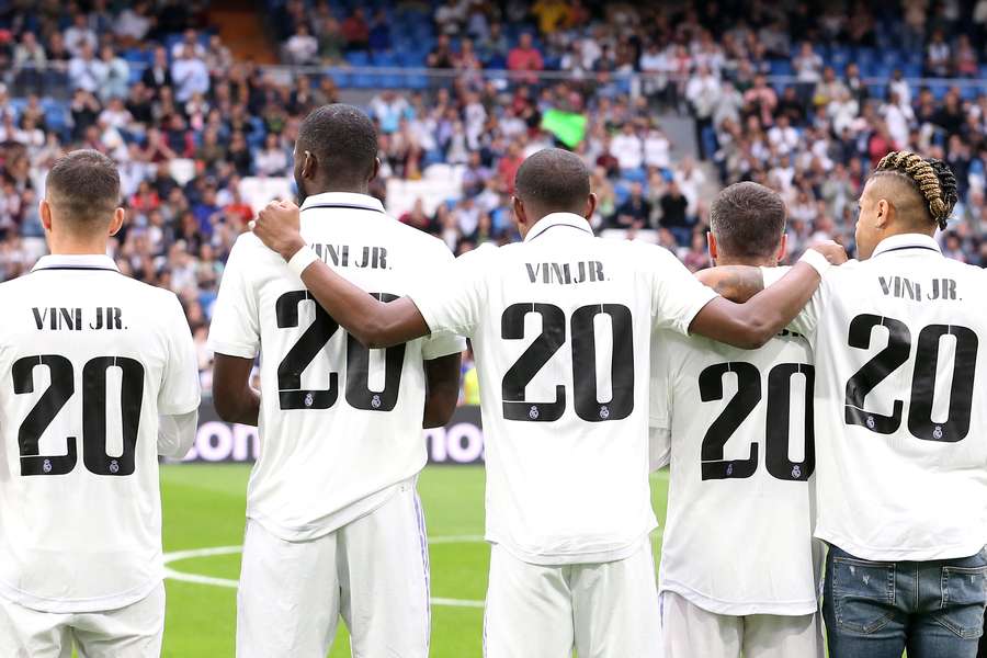 Real Madrid's players show their support to Vinicius Jr before kick off against Rayo Vallecano