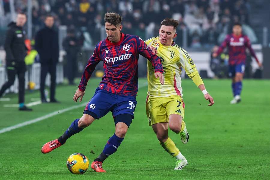 Juventus' Francisco Conceicao seen in action with Bologna's Juan Miranda at Allianz Stadium Juventus' Francisco Conceicao seen in action with Bologna's Juan Miranda at Allianz Stadium