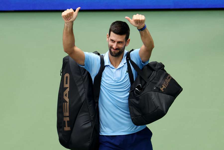 Serbia's Novak Djokovic waves at fans after losing his semi-final match against Spain's Carlos Alcaraz