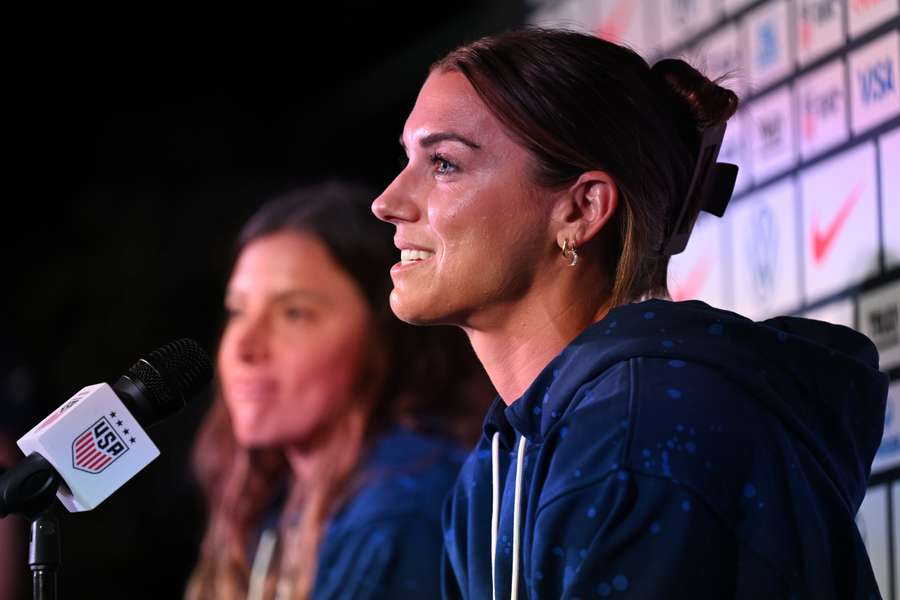 USA's forward #13 Alex Morgan speaks beside USA's defender #03 Sofia Huerta during a press conference in Auckland