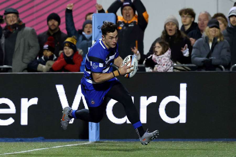 Henry Arundell of Bath breaks clear to score his second try