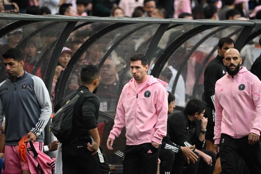 Angry fans in Hong Kong booed and gave thumbs-down gestures after Lionel Messi failed to take the field in a sold-out and much-hyped friendly