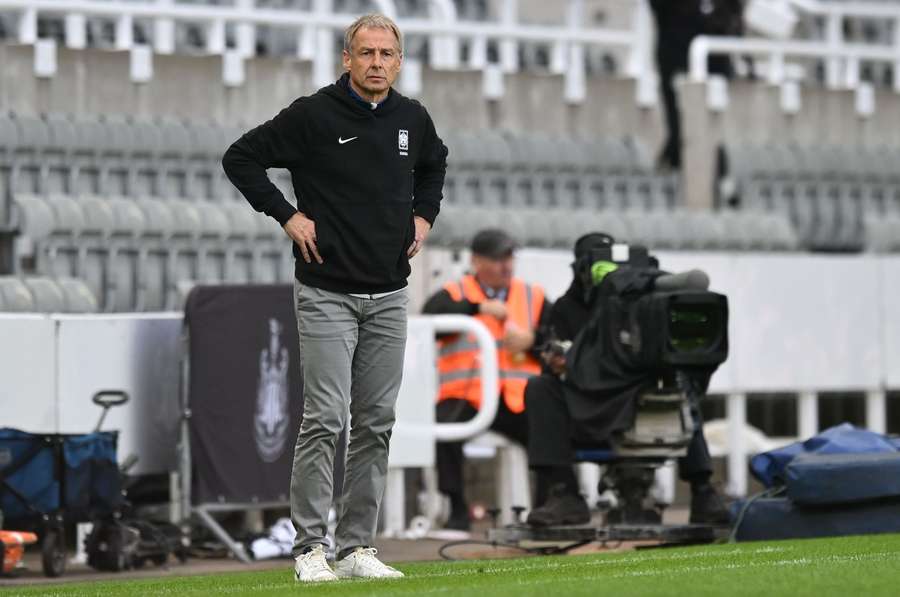 Klinsmann watches on as his side play a match against Saudi Arabia