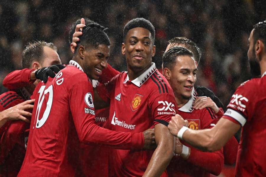 Marcus Rashford (L) celebrates with teammates during Manchester United's recent win over Nottingham Forest