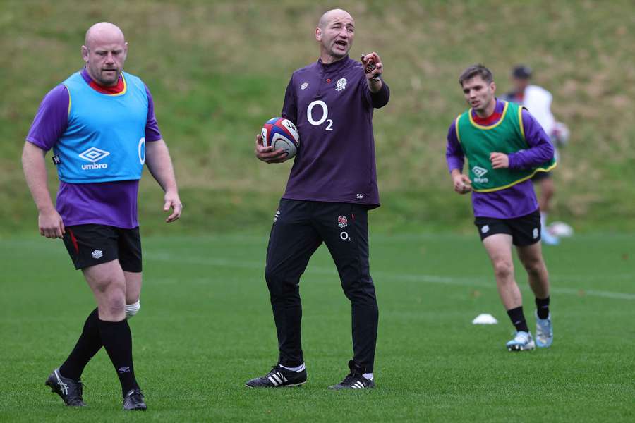 England coach Steve Borthwick (C) during a training session