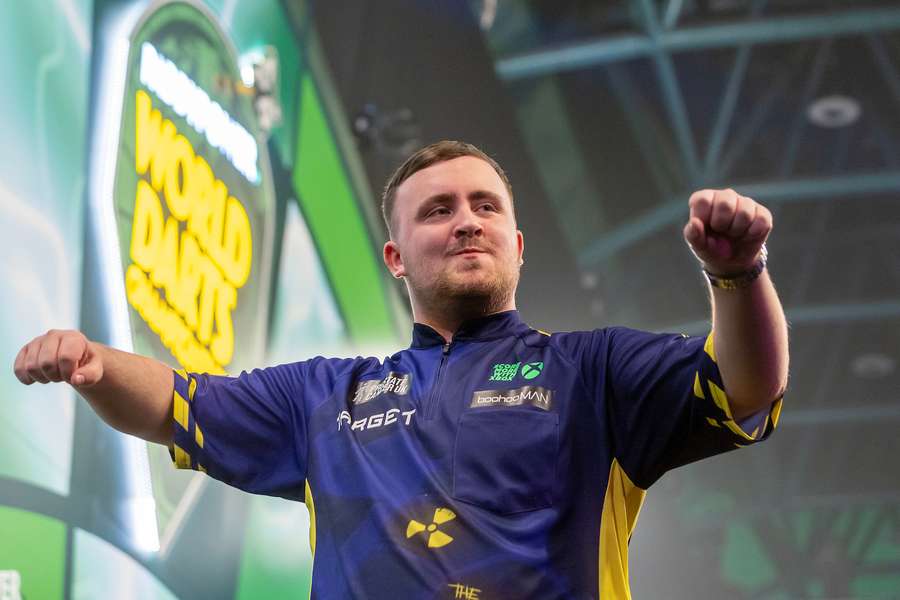 Luke Littler reacts during his match against Ryan Joyce